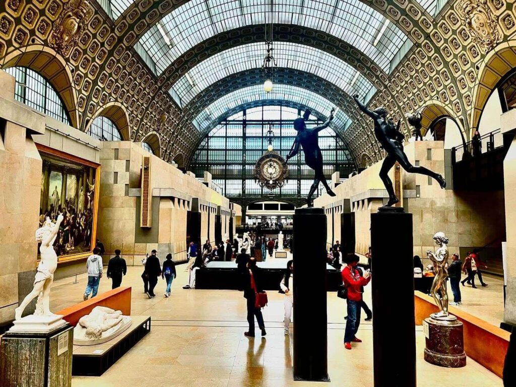 Seating area inside Musée d'Orsay for visitors taking breaks