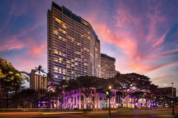 Luxury high-rise exterior of The Ritz-Carlton Residences, Waikiki Beach overlooking the Waikiki skyline and Pacific Ocean
