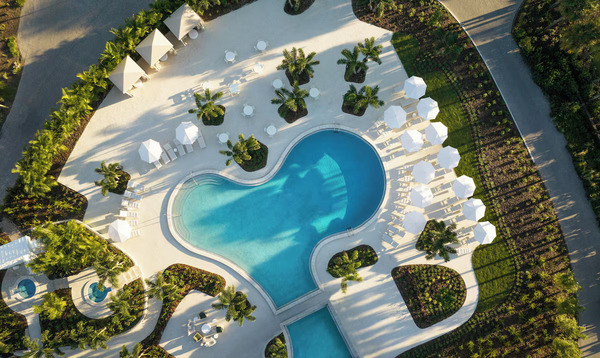Scenic view of Saddlebrook Resort featuring lush golf courses, luxury resort accommodations, palm-lined pathways, tennis facilities, and a relaxing upscale retreat atmosphere in Florida.