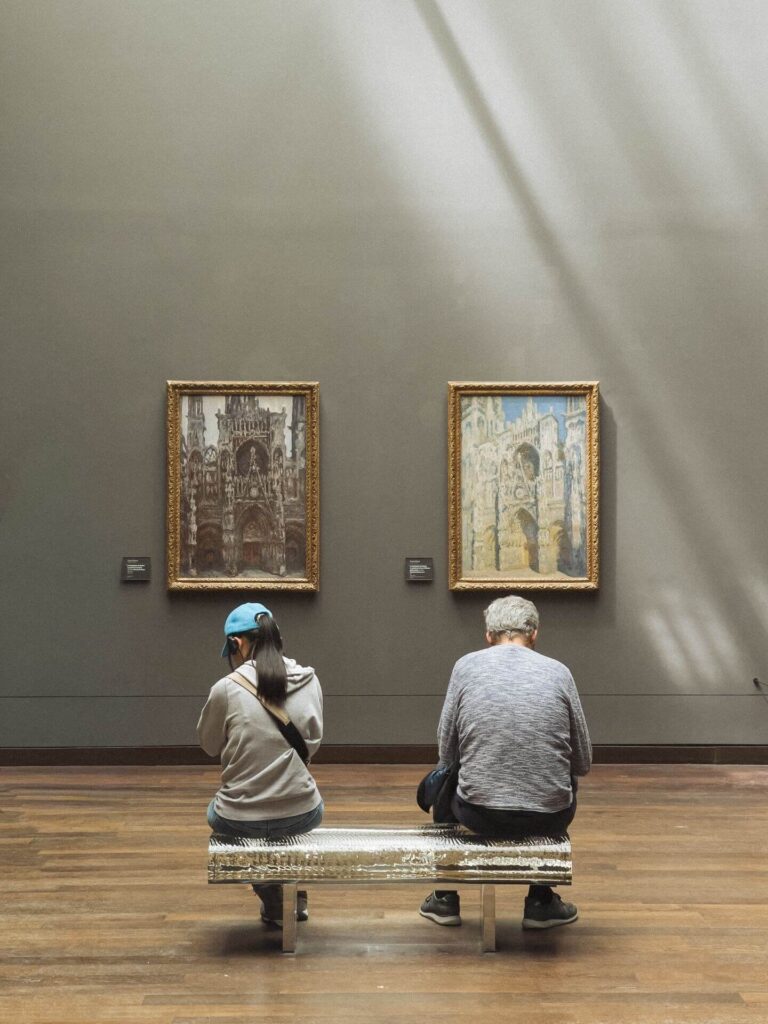 Visitor resting inside the central hall of Musée d'Orsay