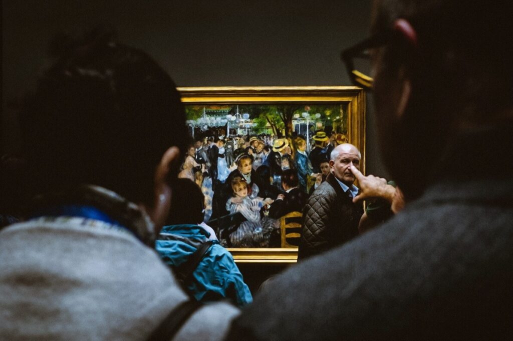 Visitors looking at Vincent van Gogh paintings inside Musée d'Orsay
