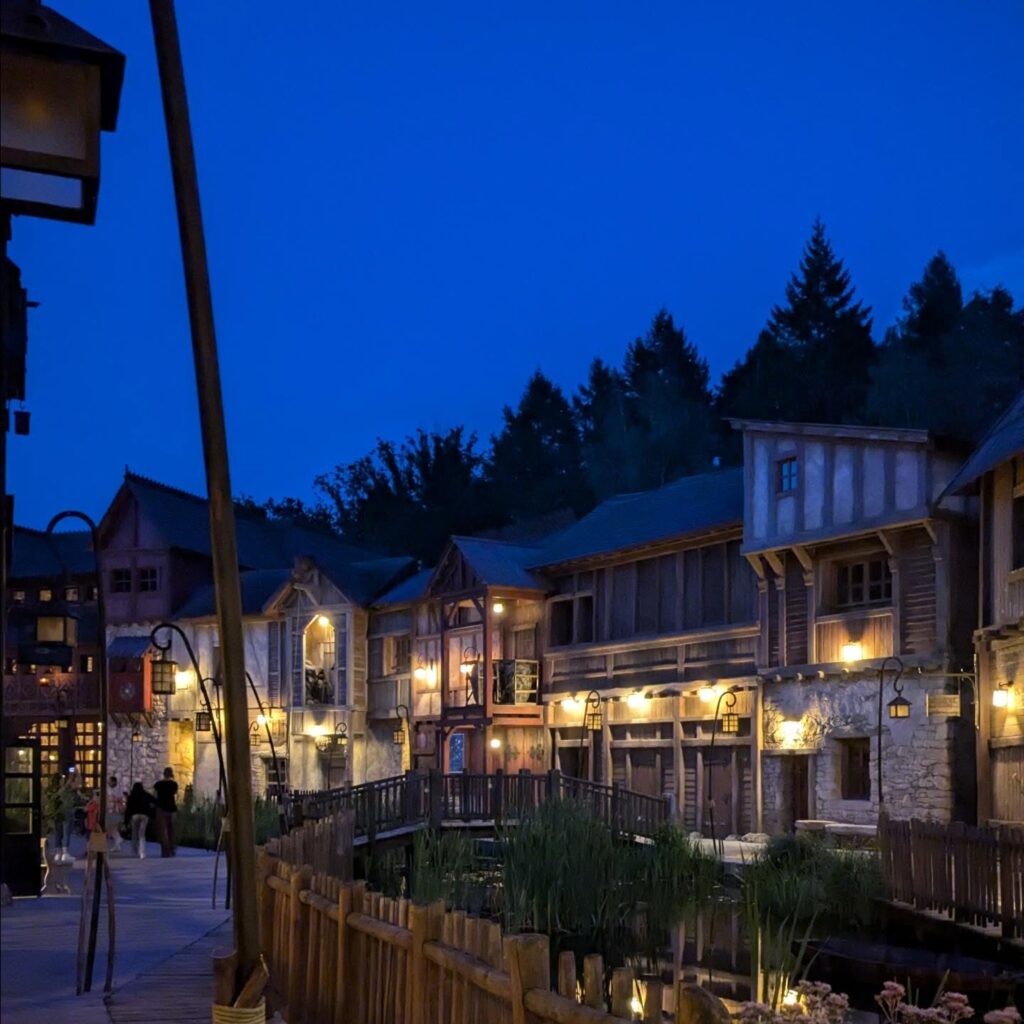 Viking themed area with wooden buildings at Parc Astérix