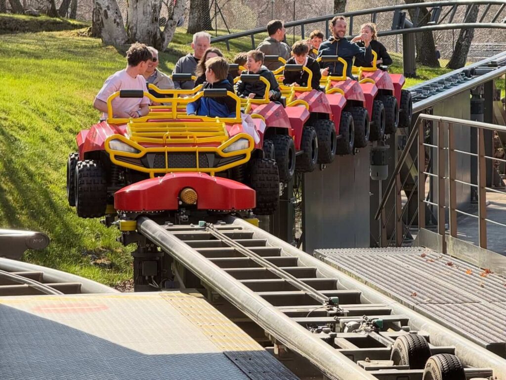 Family enjoying interactive exhibits and attractions at Vulcania