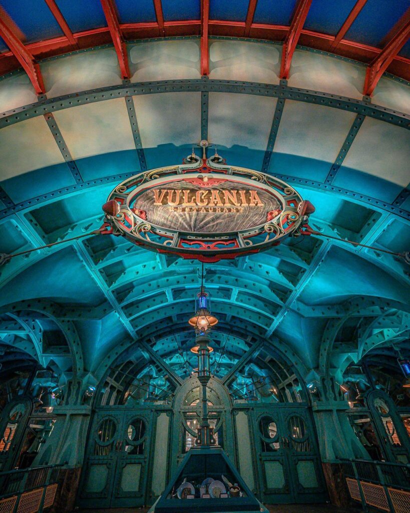 Visitors dining at a restaurant inside Vulcania theme park