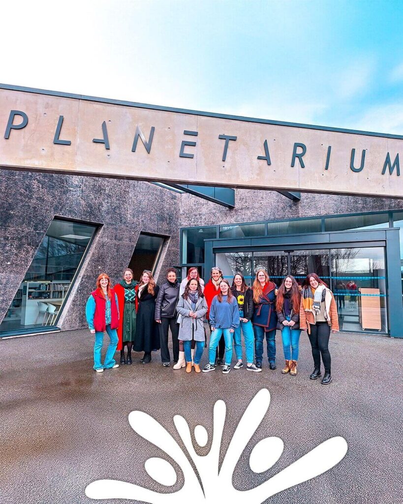 Visitors using a map to plan their day at Vulcania