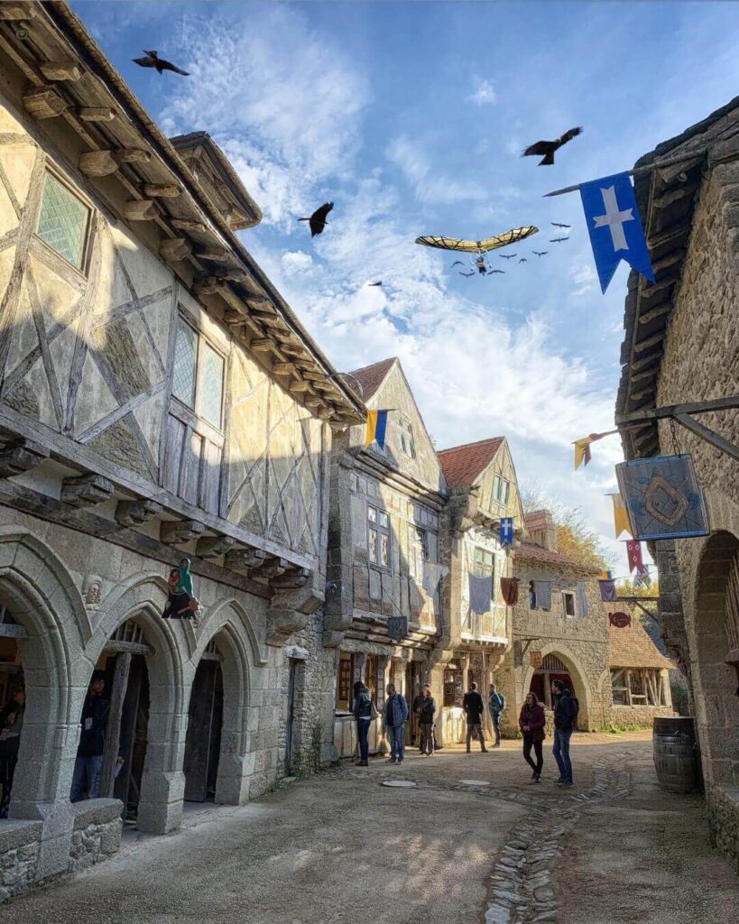 Visitors walking between attractions and shows at Puy du Fou