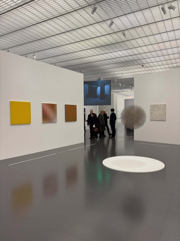 Visitor exploring modern art galleries inside Centre Pompidou in Paris