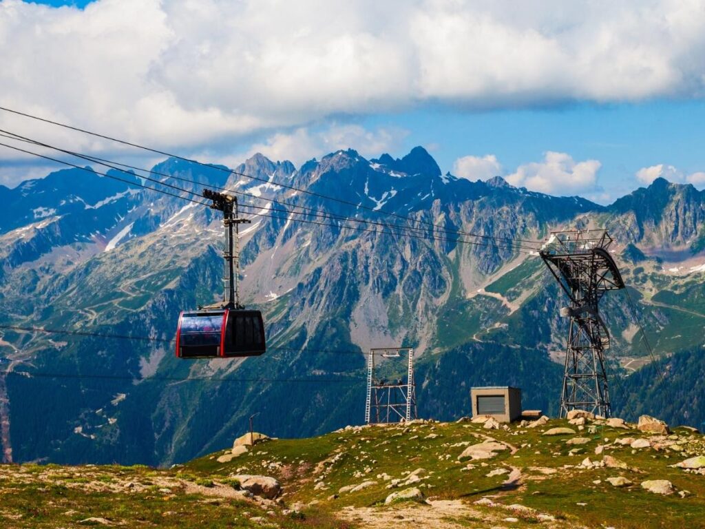 Aiguille du Midi cable car ascending above the Chamonix Valley