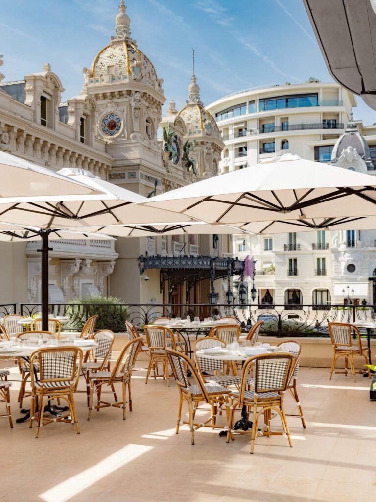 Outdoor terrace seating at Café de Paris in Monaco