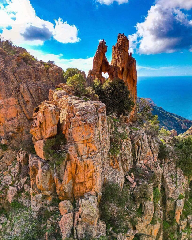 Panoramic view of the Calanques de Piana with red granite cliffs overlooking the Gulf of Porto