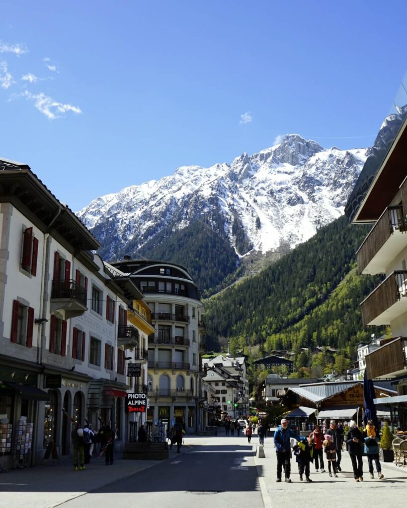 Cafés, shops, and mountain views in the center of Chamonix