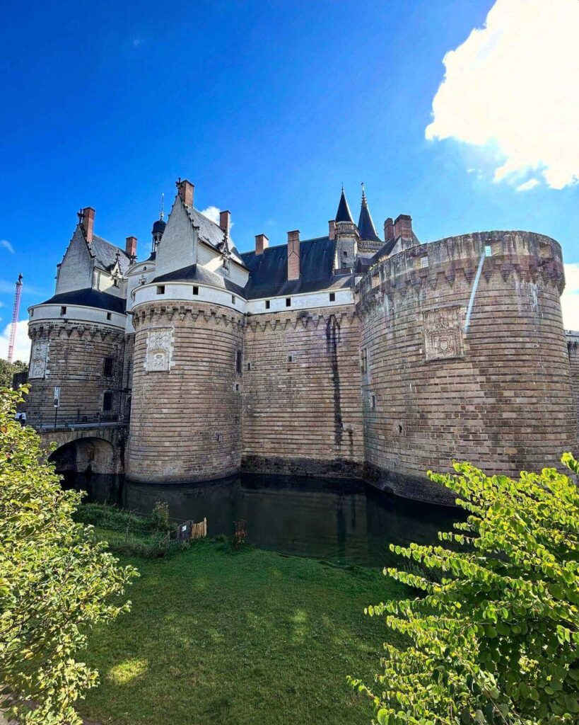 Château des ducs de Bretagne with medieval walls, towers, and surrounding moat in Nantes