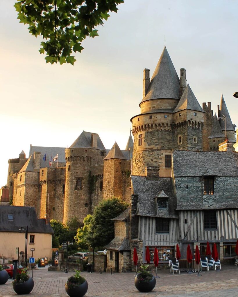 Château des ducs de Bretagne at sunset reflected in the moat