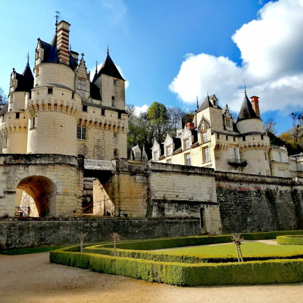Panoramic view of Château d'Ussé showcasing its fairy-tale architecture and surrounding countryside