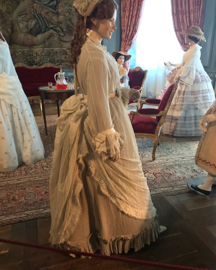 Sleeping Beauty display inside Château d'Ussé featuring life-sized figures and costumes