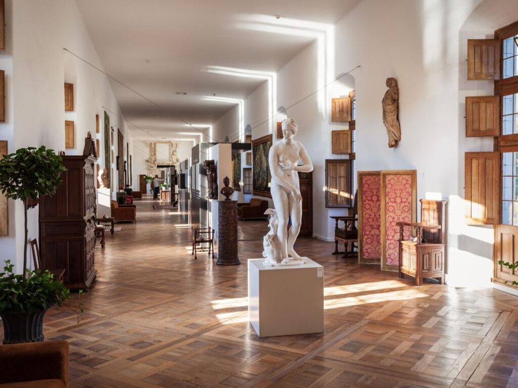 Grand Gallery inside Château de Chenonceau with black and white tiled floor
