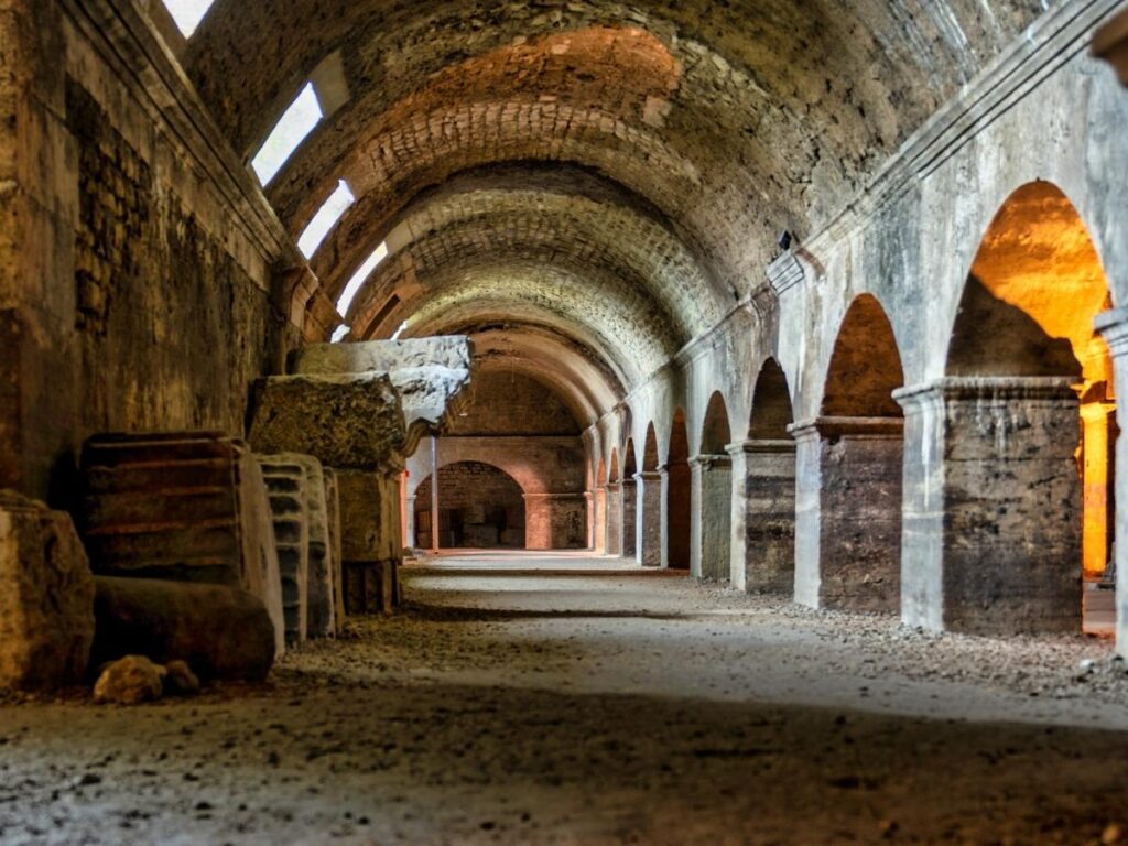 Atmospheric underground corridor inside the Cryptoporticus of Arles