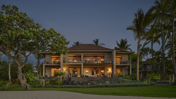 Luxury oceanfront setting at Four Seasons Resort Hualalai on Hawaii Island, featuring elegant villas, pristine pools, swaying palm trees, and stunning Pacific Ocean views, showcasing one of the finest luxury resort experiences in Hawaii.