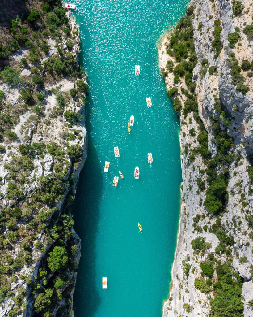 Visitors kayaking through Gorges du Verdon during summer