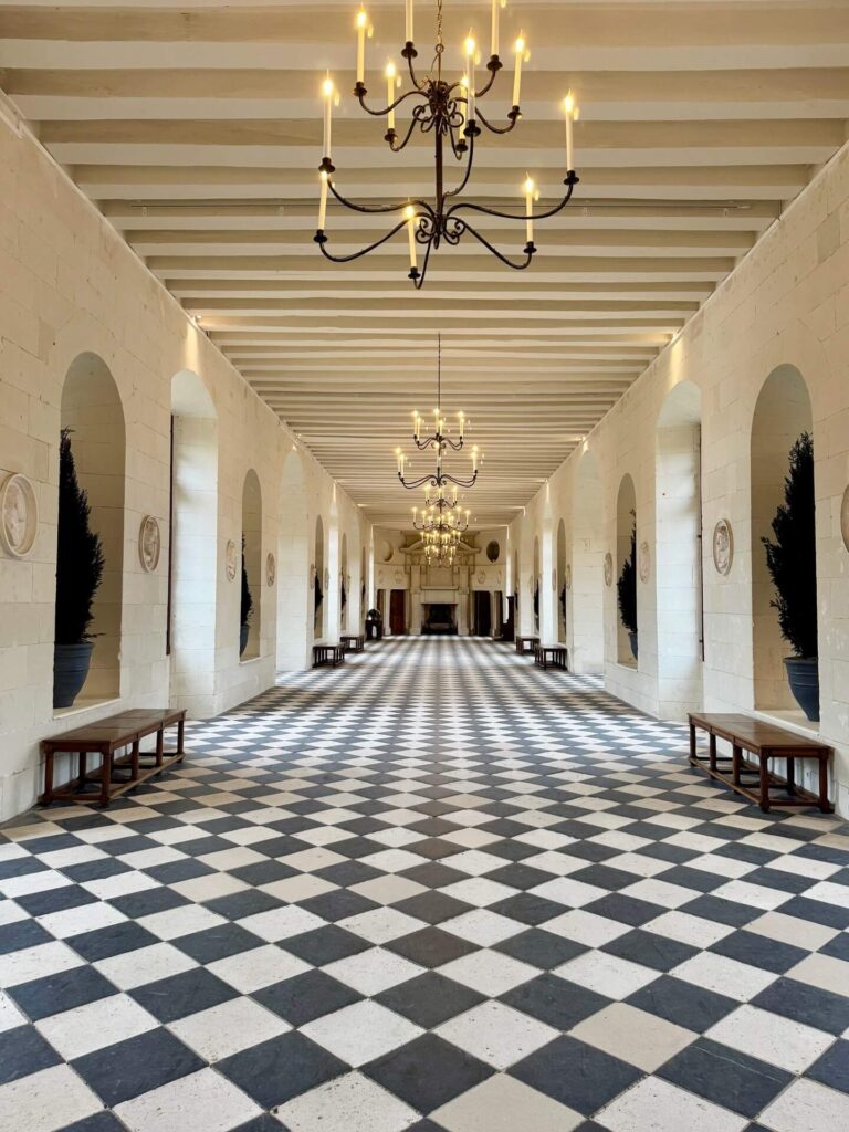 Grand Gallery inside Château de Chenonceau with black and white tiled floor