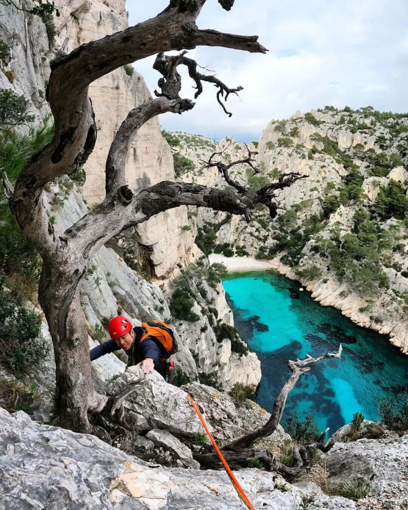 Hikers on a coastal trail in Calanques National Park