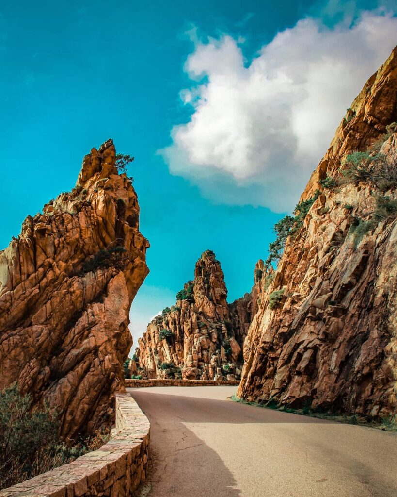 Red granite cliffs of the Calanques de Piana overlooking the Gulf of Porto in Corsica