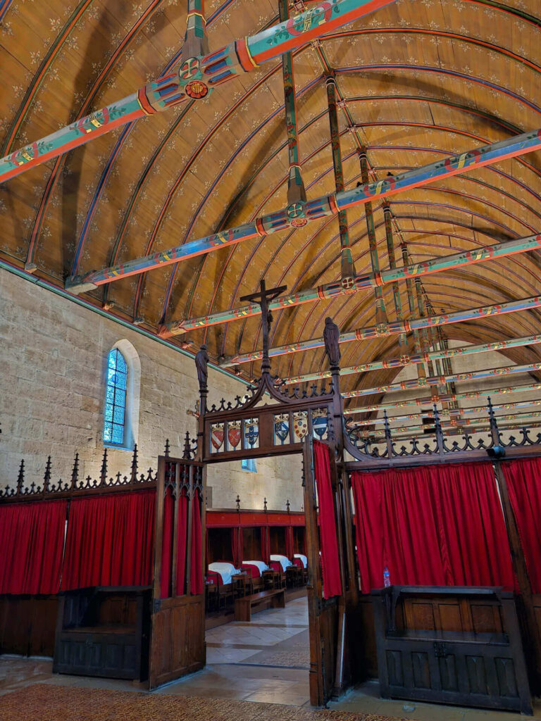 Historic interior of Hospices de Beaune featuring medieval hospital architecture