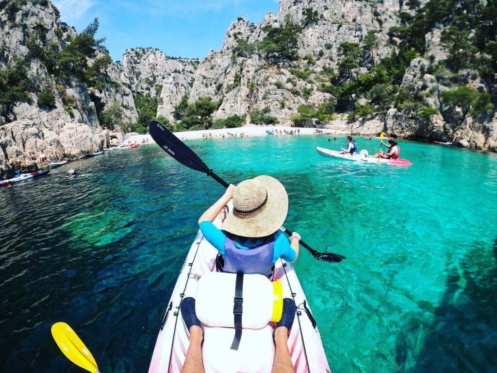 Kayakers exploring a secluded calanque near Cassis
