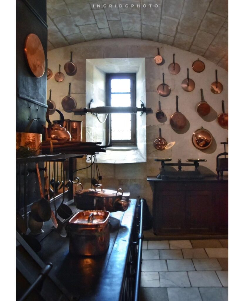 Historic kitchens beneath Château de Chenonceau with copper cookware