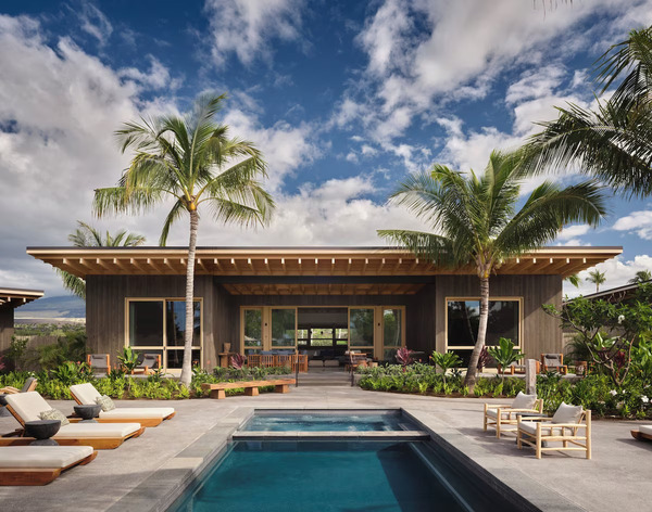 Scenic view of Kona Village, A Rosewood Resort on Hawaii's Big Island, showcasing traditional hale-style accommodations, pristine beachfront, tropical landscapes, and a tranquil luxury island atmosphere.