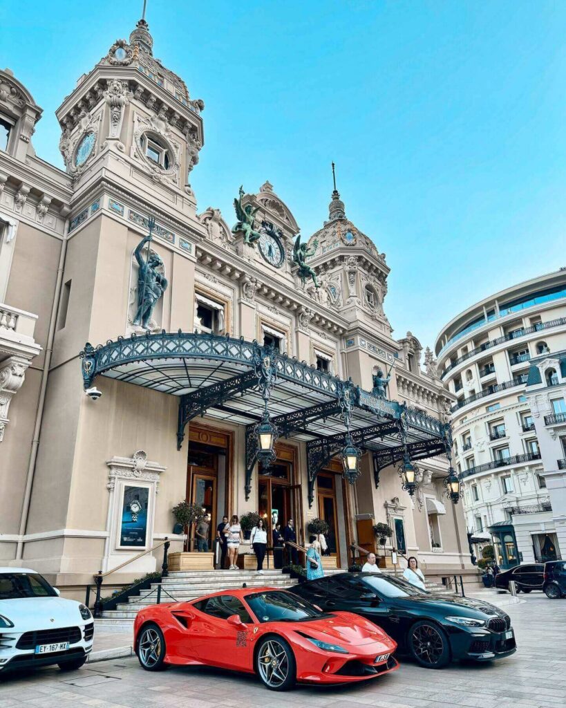 Luxury sports cars parked outside Monte Carlo Casino