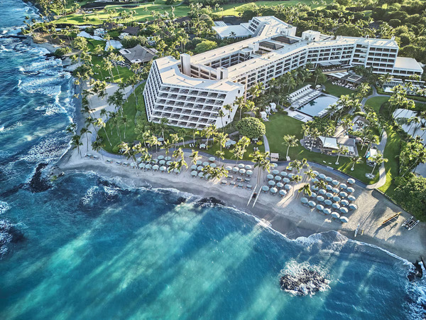 Beautiful coastal setting at Mauna Lani, Auberge Resorts Collection on Hawaii's Big Island, featuring elegant oceanfront accommodations, white-sand beaches, swaying palm trees, and a refined Hawaiian luxury experience.