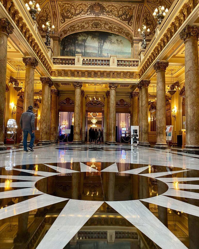 Ornate staircase and Belle Époque architecture inside Monte Carlo Casino