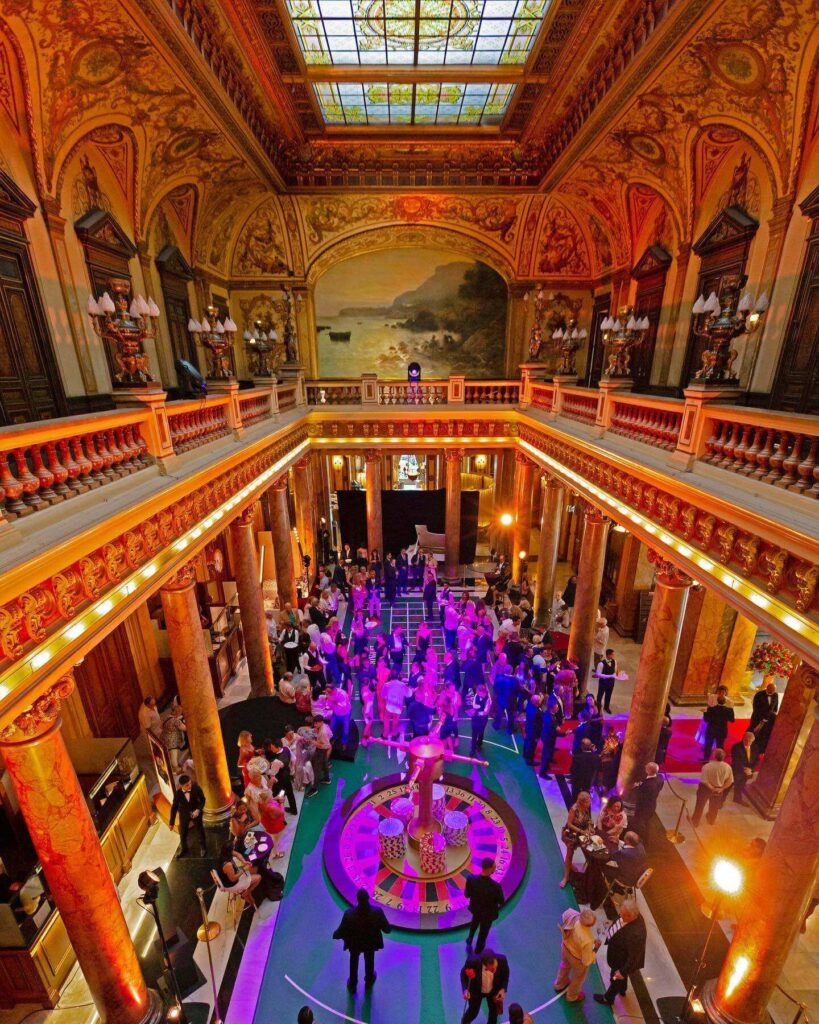 Visitor admiring the historic interior of Monte Carlo Casino