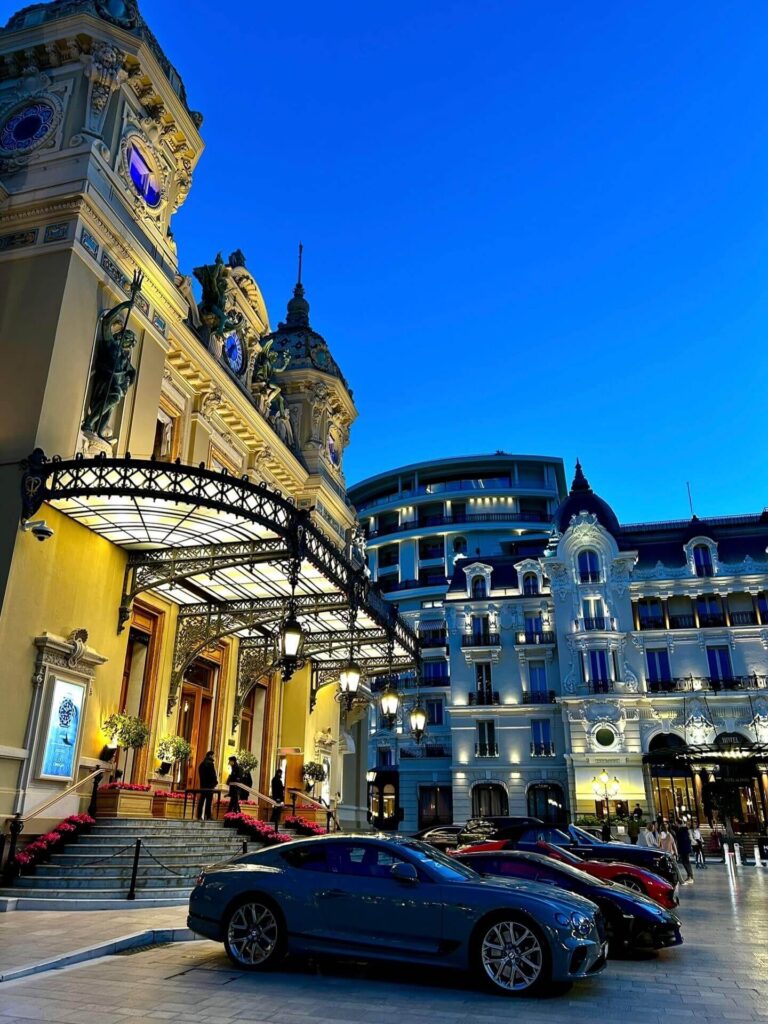 Monte Carlo Casino illuminated after sunset in Monaco