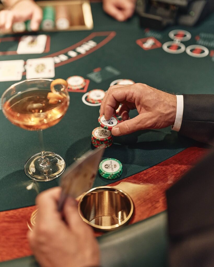 Poker table inside Monte Carlo Casino with cards and chips