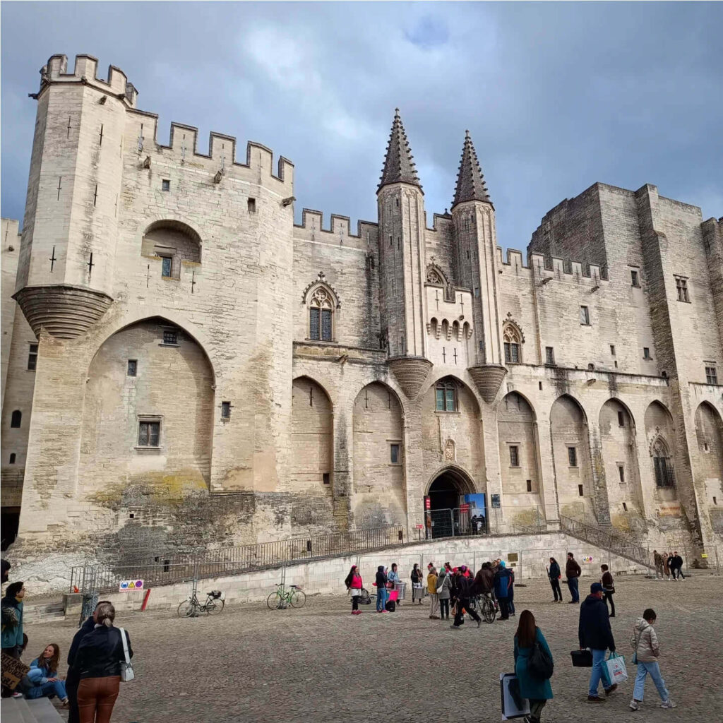Gothic architecture and fortified walls of Palais des Papes in Avignon