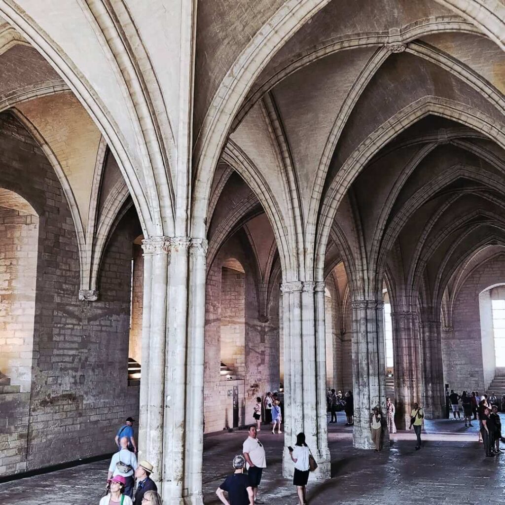 Large Gothic interior hall inside Palais des Papes in Avignon