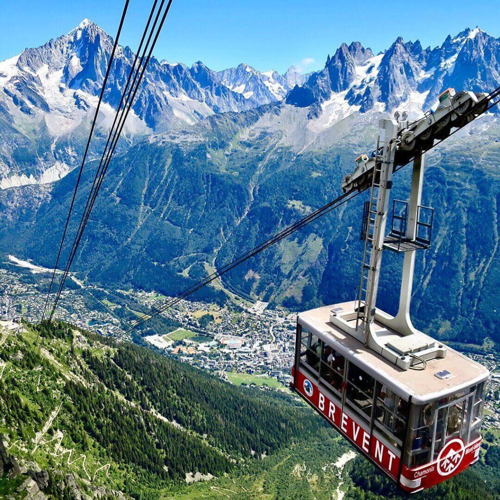 Panoramic Mont Blanc gondola crossing above glaciers between France and Italy