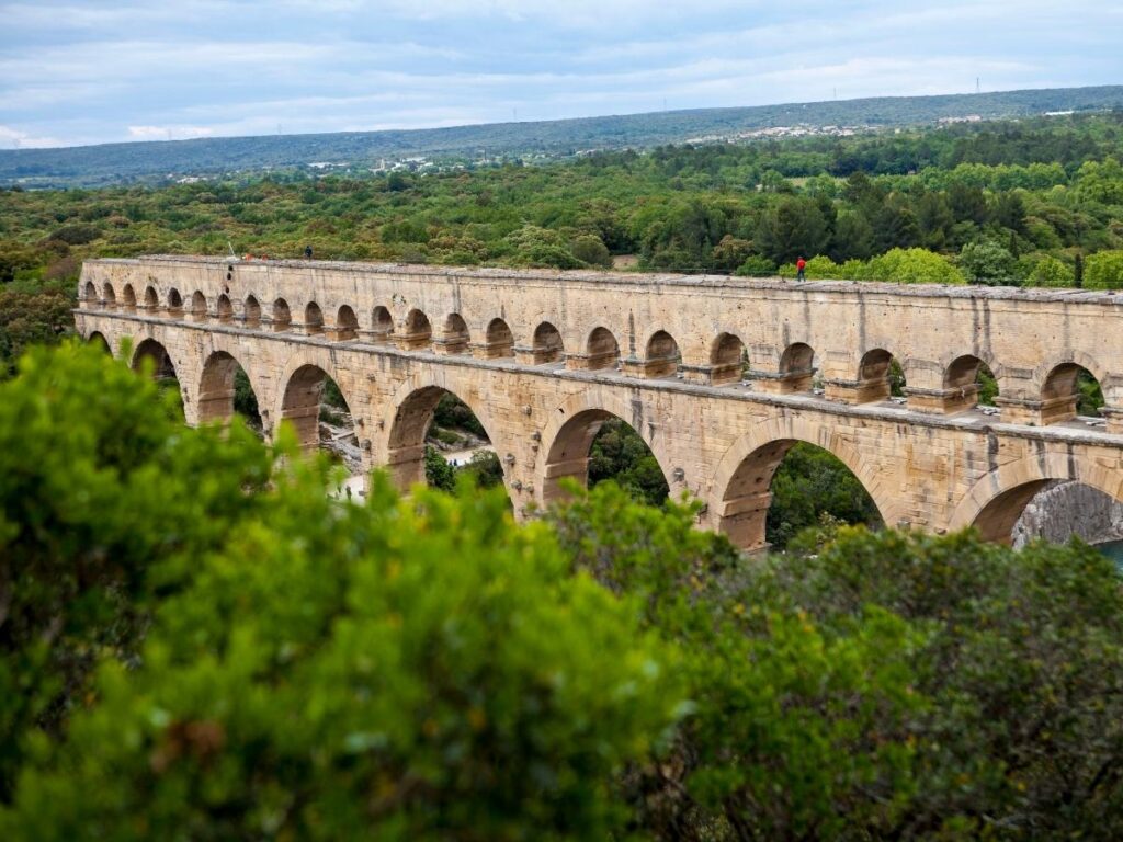 Pont du Gard surrounded by the natural landscape of the Gardon River valley