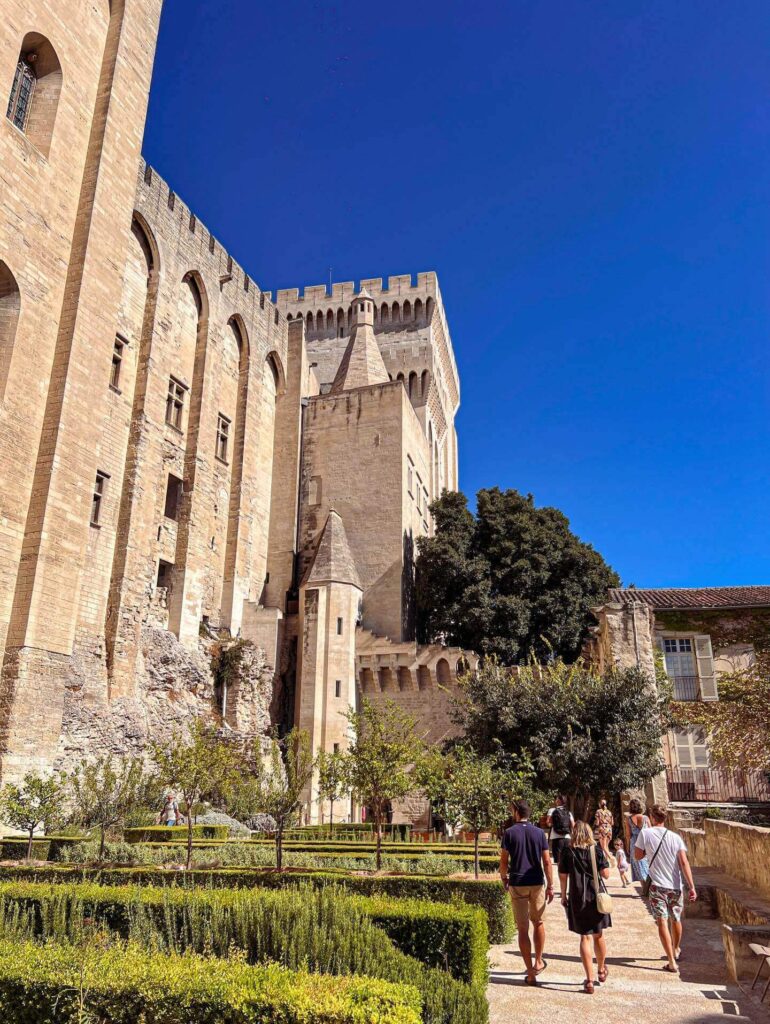 Restored courtyard inside Palais des Papes following centuries of preservation efforts