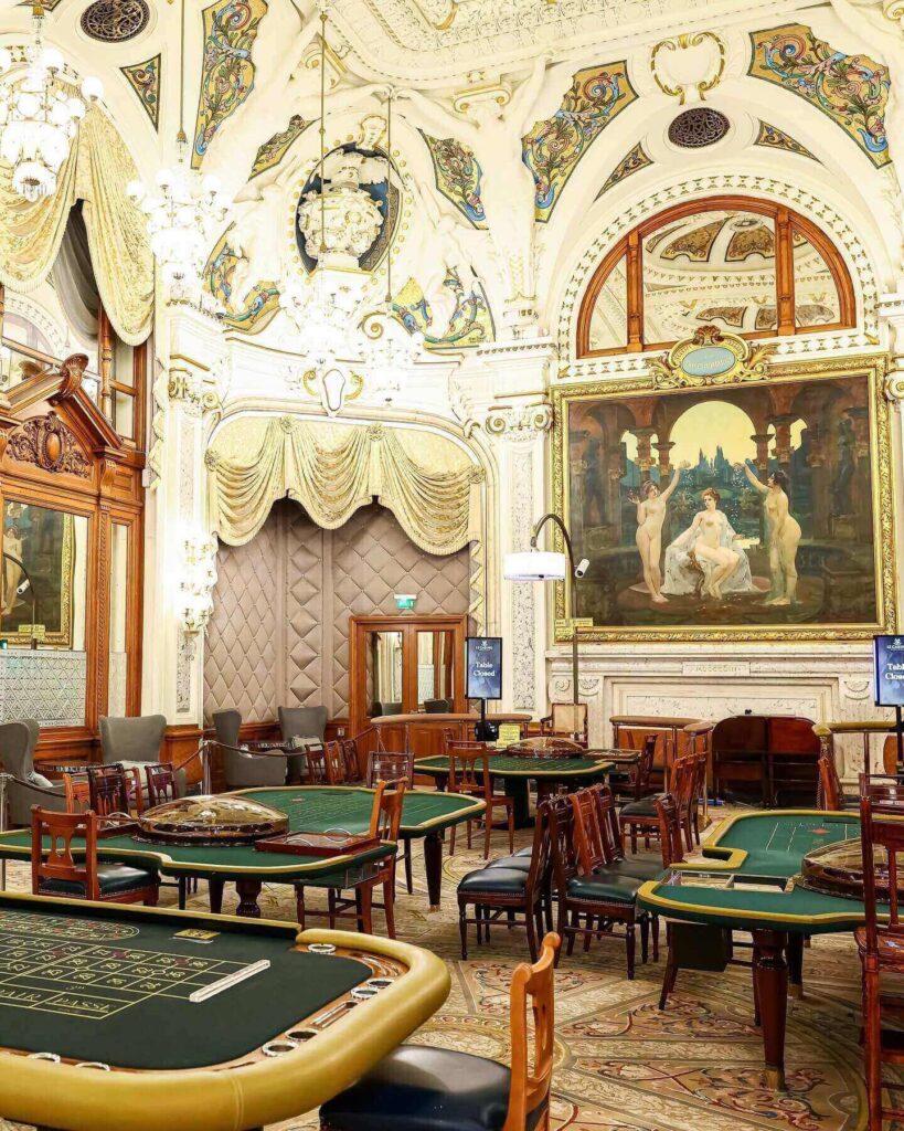 Elegant Salle Blanche room inside Monte Carlo Casino with white and gold decor