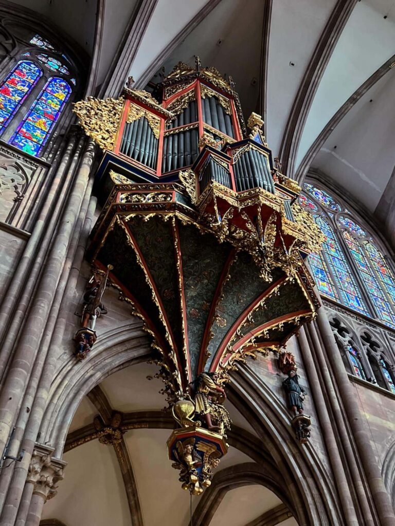 Decorative pipe organ inside Strasbourg Cathedral