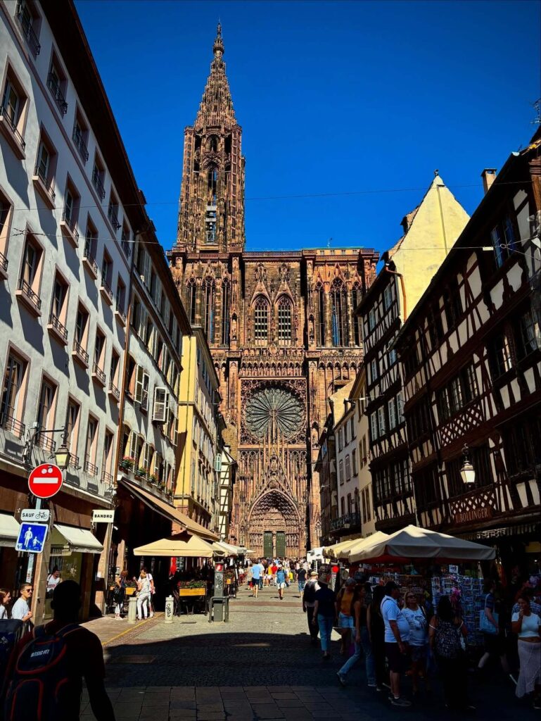 Strasbourg Cathedral spire rising above the rooftops of Strasbourg Old Town