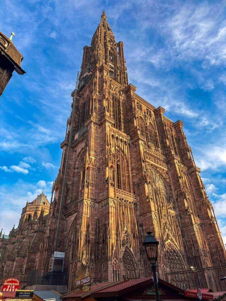 Strasbourg Cathedral spire towering above the rooftops of Strasbourg