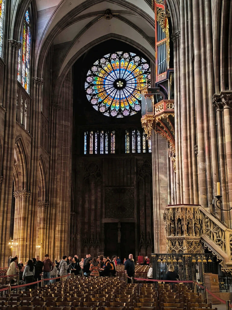 Visitors enjoying Cathedral Square during summer in Strasbourg