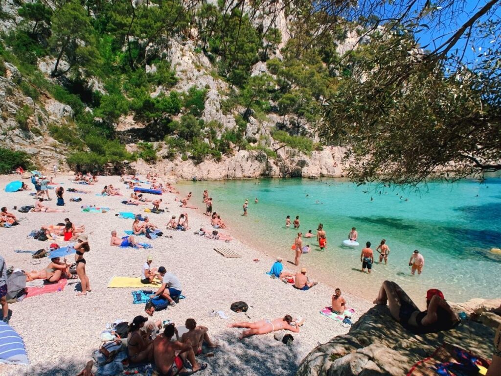 Visitors swimming in Calanque d'En-Vau