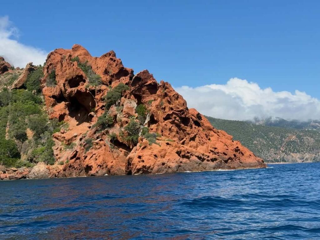 Untouched cliffs and crystal-clear water in Scandola Nature Reserve