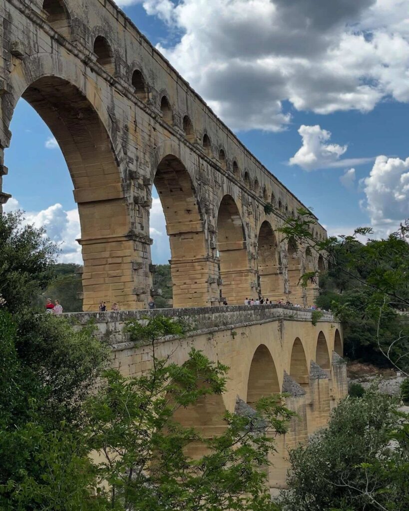 Visitors walking across the accessible sections of Pont du Gard