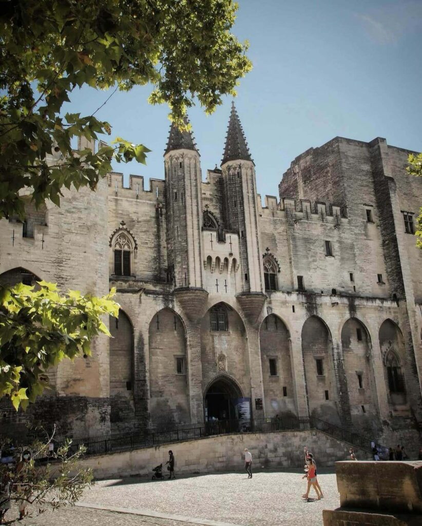 Fortress-like exterior of Palais des Papes built during the Avignon Papacy
